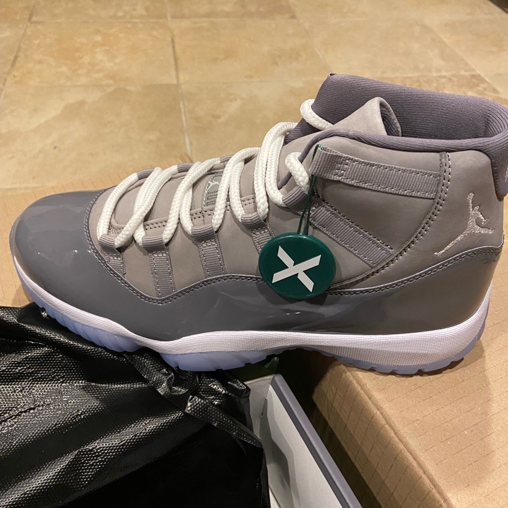 Brand new size 10 cool greys. Never worn